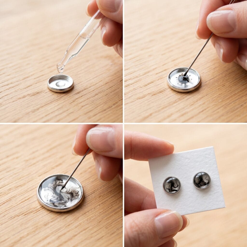 A hand adjusting a linen display board holding a pair of finished abstract black ink UV resin stud earrings.