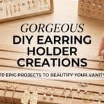 A manicured hand placing gold dangle earrings into a functional slotted wood DIY holder for organizing jewelry.