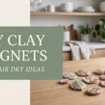 Beautifully arranged handmade clay magnets spread on an oak table next to a sage green text block reading DIY CLAY MAGNETS.