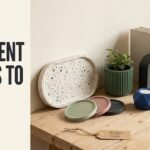 Collection of cement crafts to sell on a warm artisan workbench