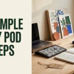 Print on demand for Etsy beginner workspace with planning notebook, artwork tablet, and sample product